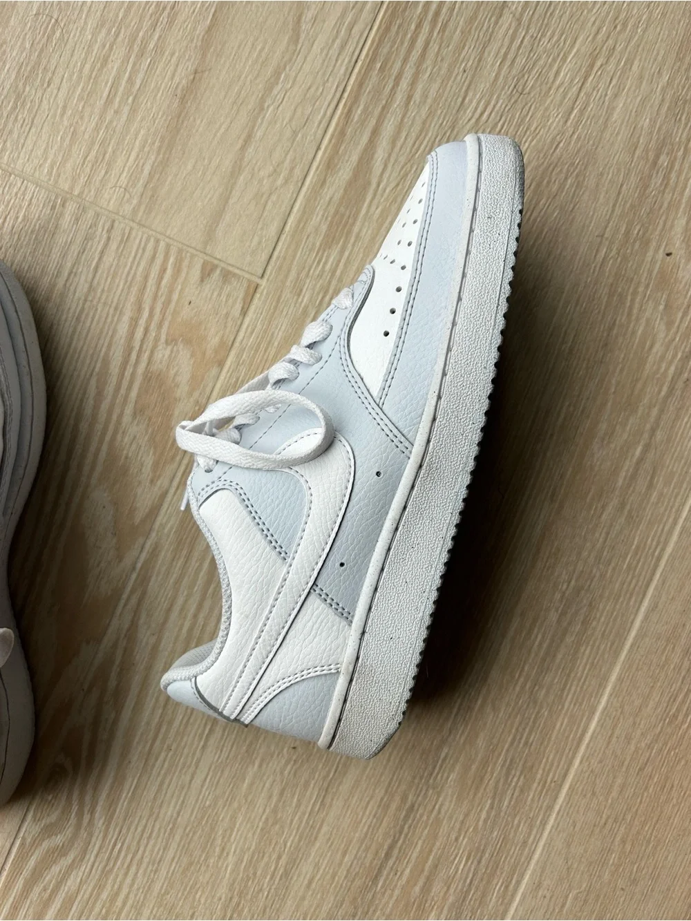 Nike White Low-Top Leather Sneakers with Subtle Gray Accents